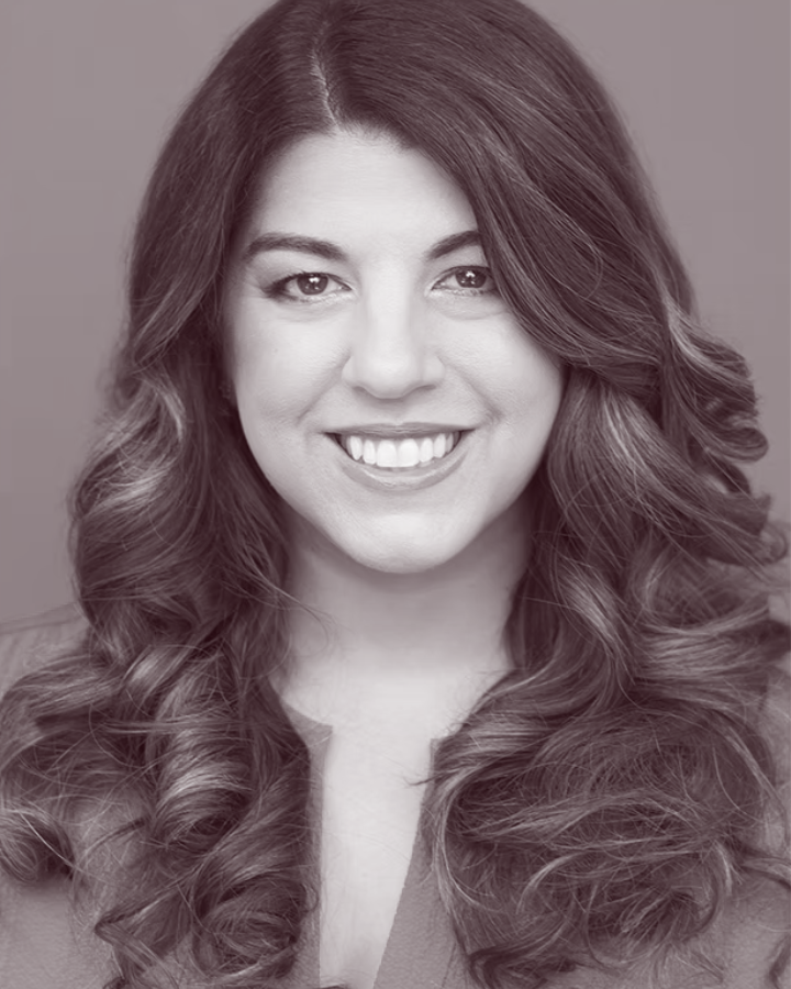 A sepia toned headshot of Erin Cross